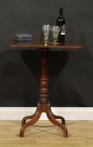 A 19th century mahogany wine table, rounded rectangular top with channelled edge, turned column,