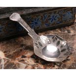 A George III silver caddy spoon, octagonal bowl, bright-cut and wriggle-work engraved, 7.5cm long,