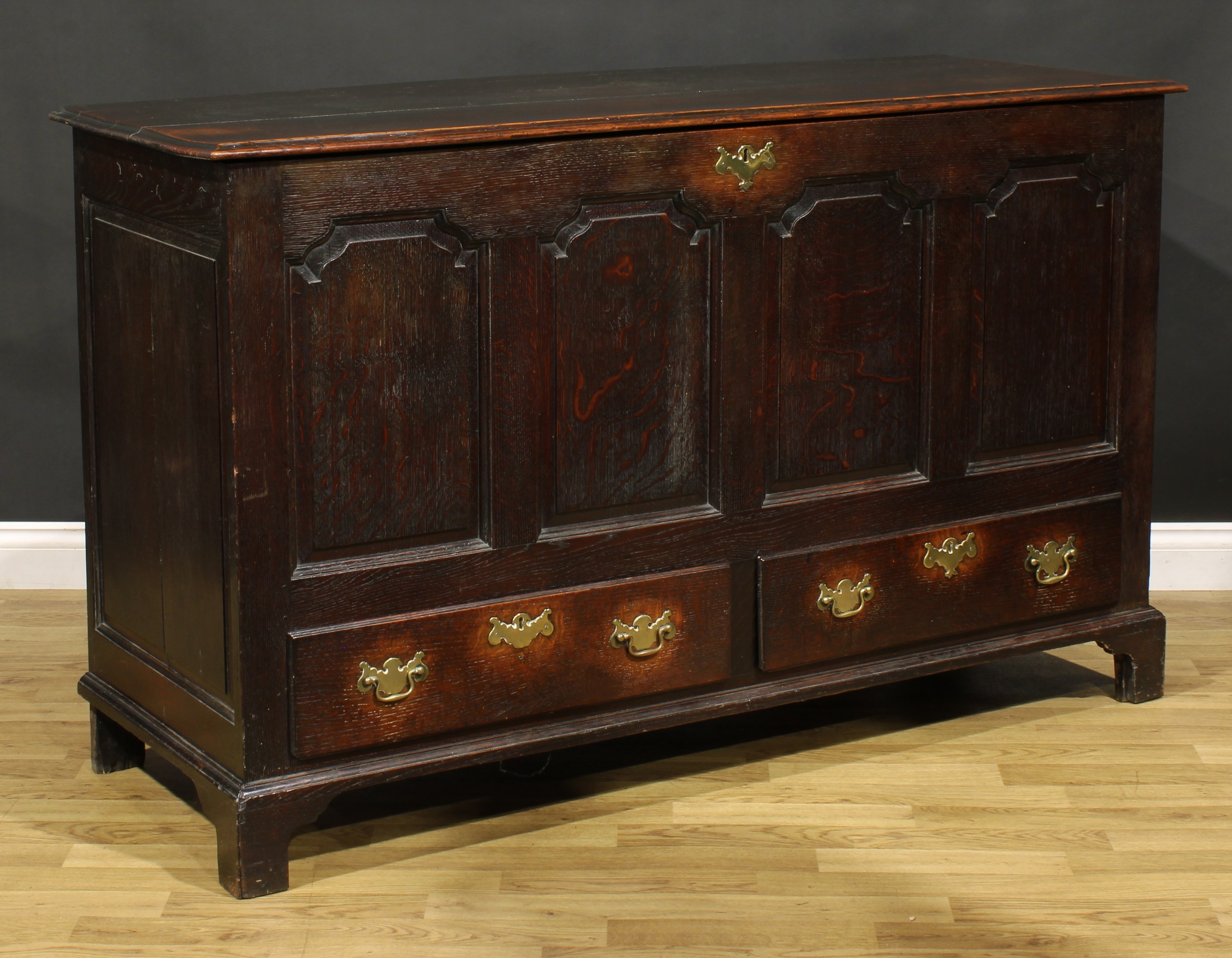 A George III oak mule chest, hinged top with moulded edge, above four shaped raised and fielded - Image 2 of 5