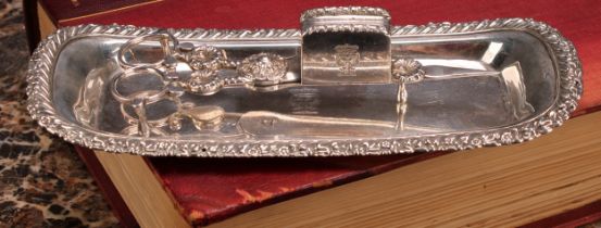 A George IV silver rounded rectangular snuffer tray, gadrooned border outlined with flowers and