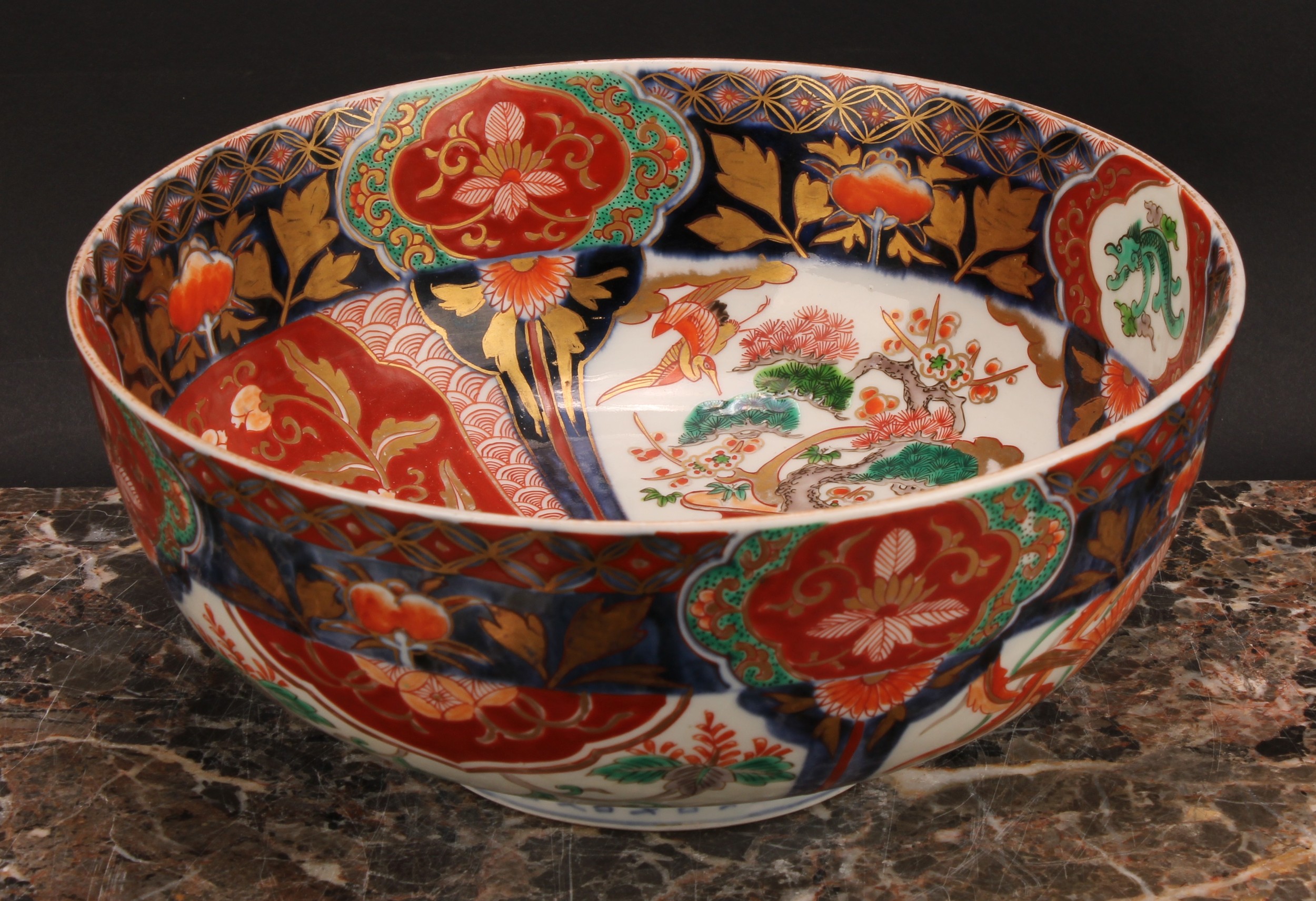 A Japanese porcelain bowl, decorated in the Imari palette, 25cm diameter, Meiji period - Image 3 of 4