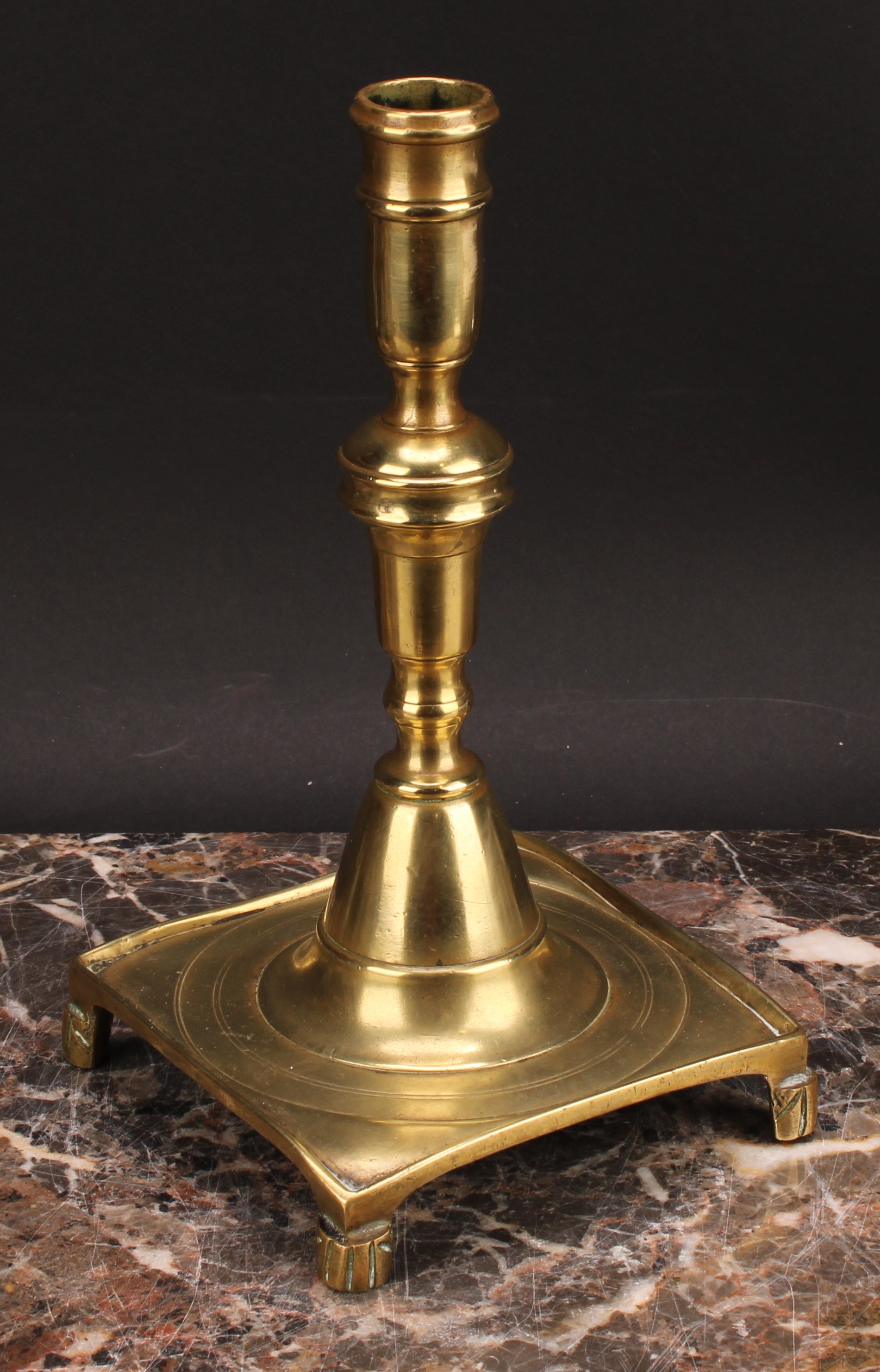 A Spanish brass tray base socket candlestick, knopped pillar, domed socle, fluted feet, 23cm high, - Image 3 of 3