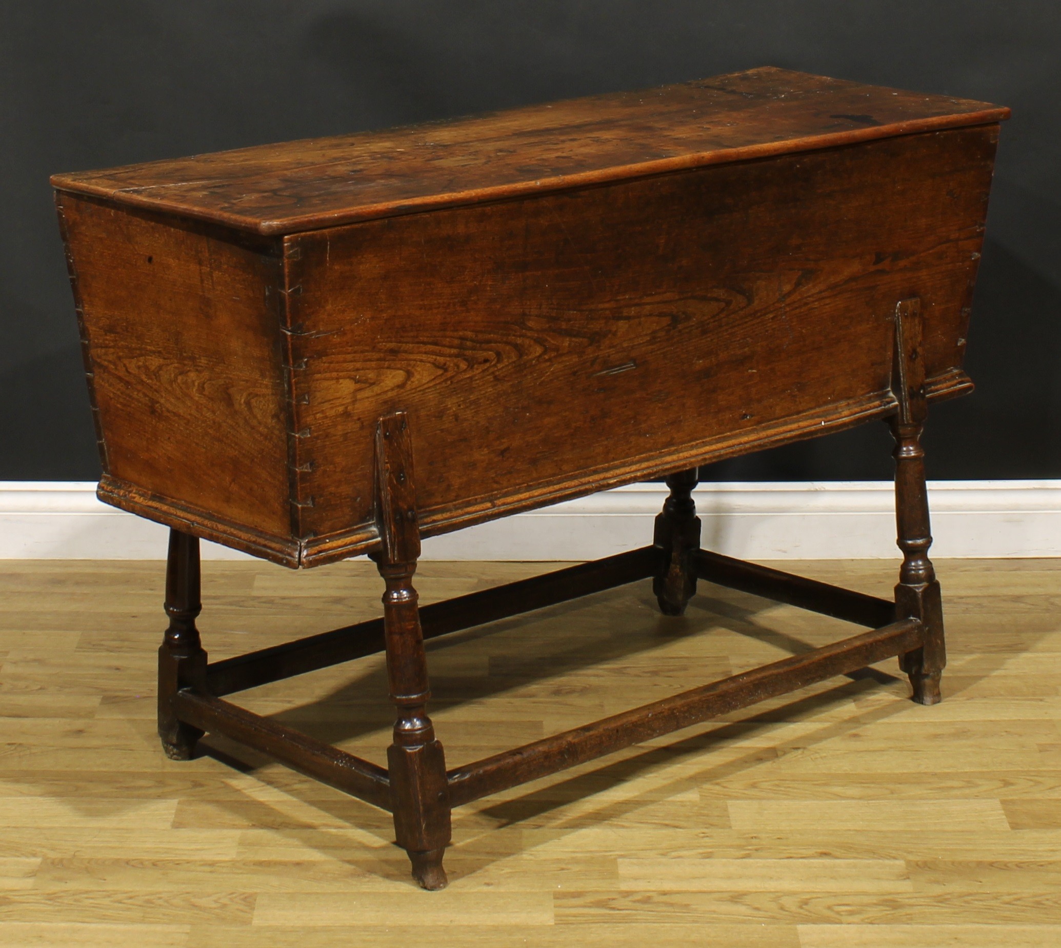 An 18th century elm dough bin, the base with turned legs, 76cm high, 121cm wide, 45cm deep - Image 2 of 5