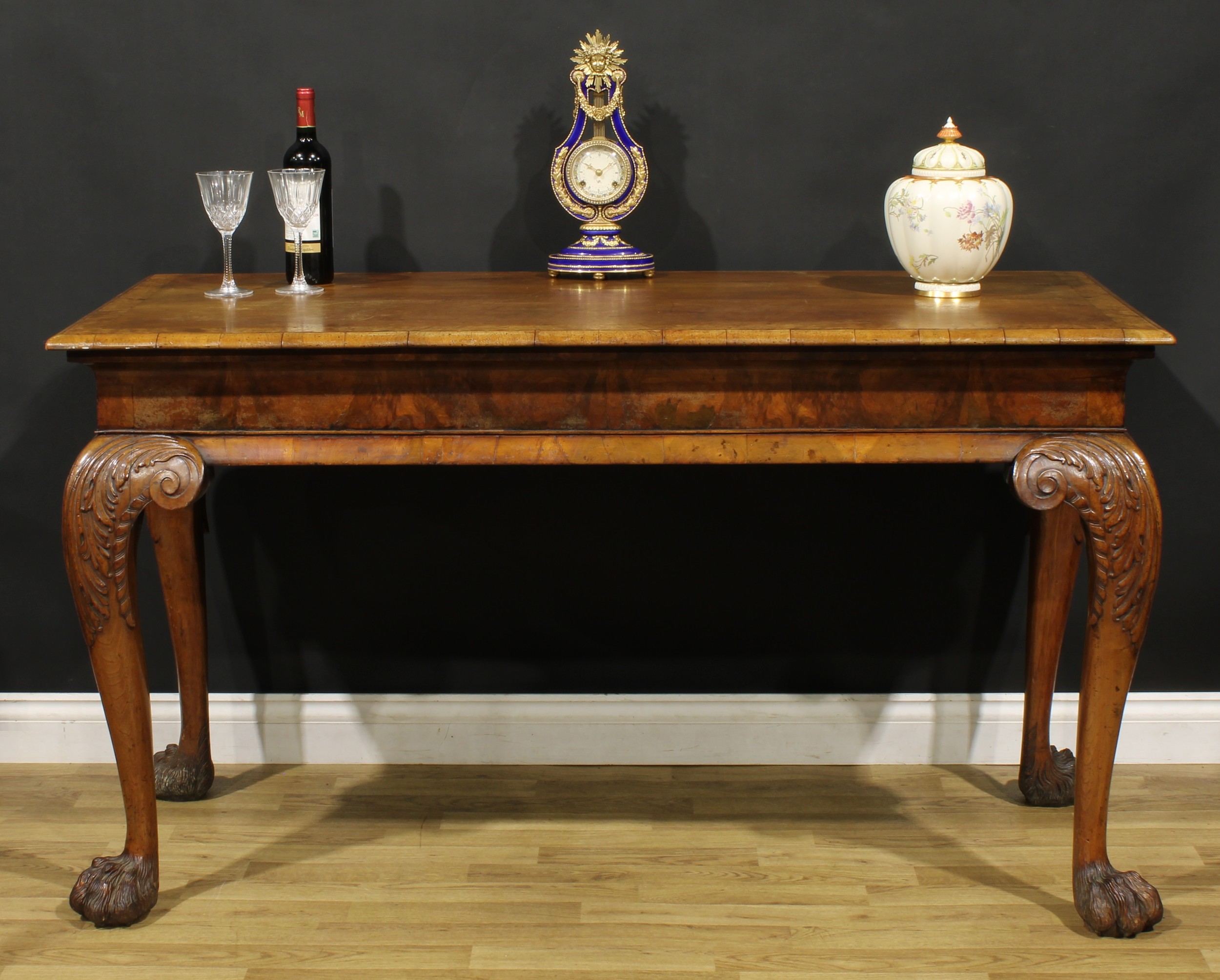 A George I Revival Irish walnut serving table, burr banded rectangular top with moulded edge above a