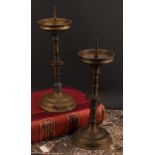A pair of 17th century style brass pricket candlesticks, knopped stems, stepped circular bases, 34cm