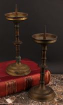 A pair of 17th century style brass pricket candlesticks, knopped stems, stepped circular bases, 34cm