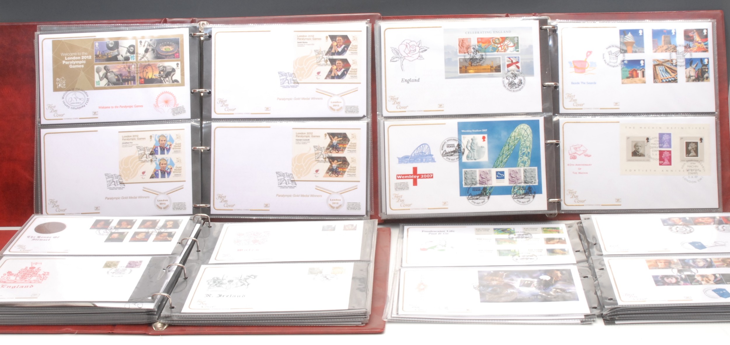 Stamps - QEII FDC collection in three binders and loose, all appear to be 'Cotswold' covers,