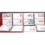 Stamps - QEII FDC collection in three binders and loose, all appear to be 'Cotswold' covers,