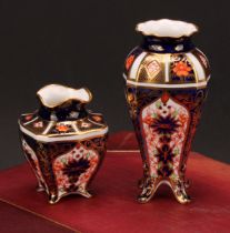 A Royal Crown Derby 1128 Imari pattern tapering shaped square vase, of slender form, pie crust