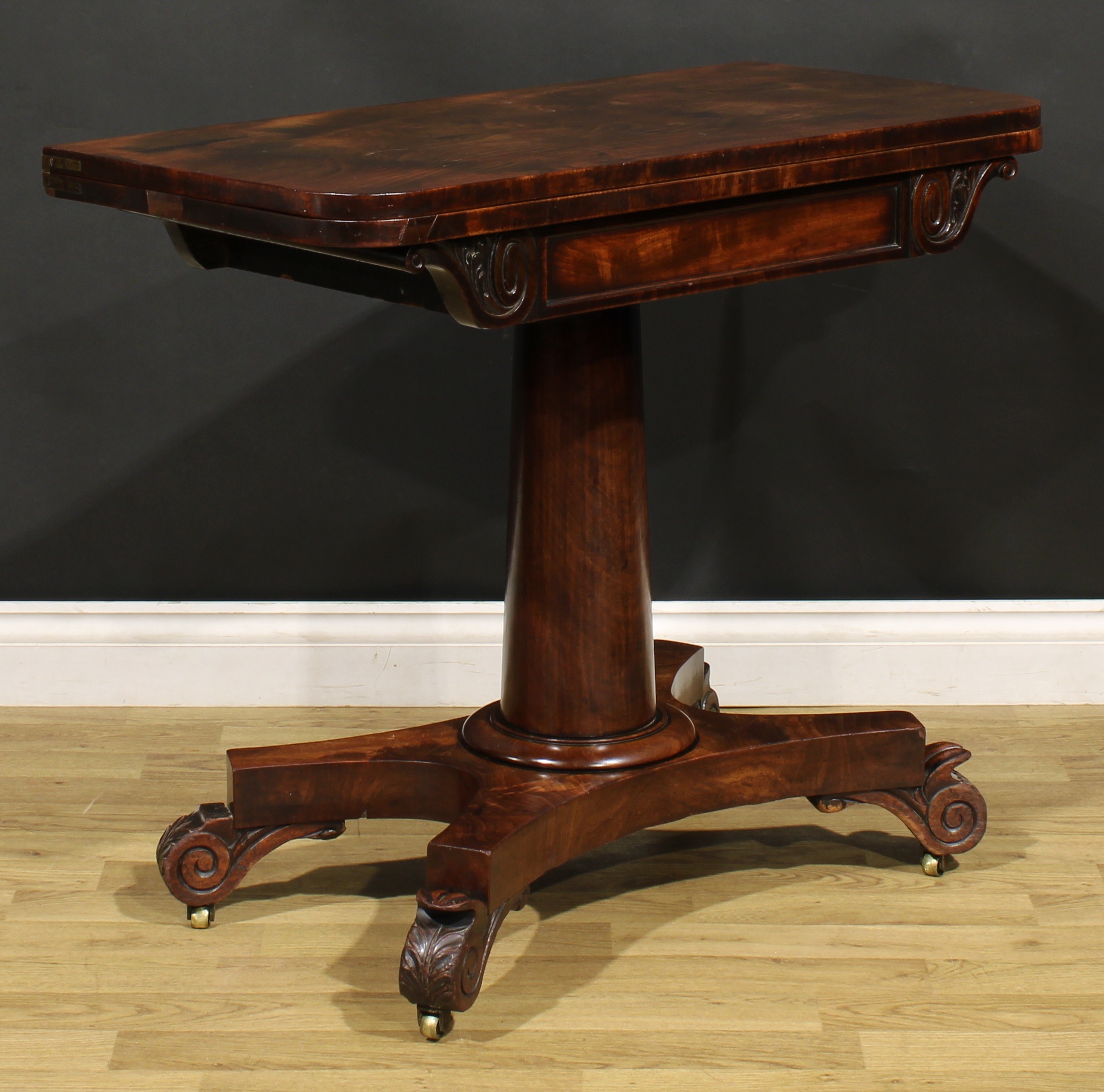 A George/William IV mahogany tea table, rounded rectangular folding top above a deep frieze carved - Image 4 of 6