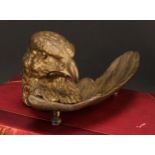 A French gilt metal novelty inkwell, cast as the head of an eagle, 28.5cm wide