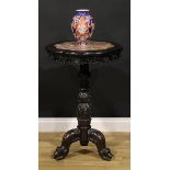 A Chinese hardwood tripod porcelain table, octofoil top with inset marble panel, turned column