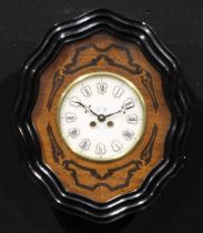 A late 19th century French ebonised and oak oeil-de-boeuf clock, 19cm alabaster dial applied with