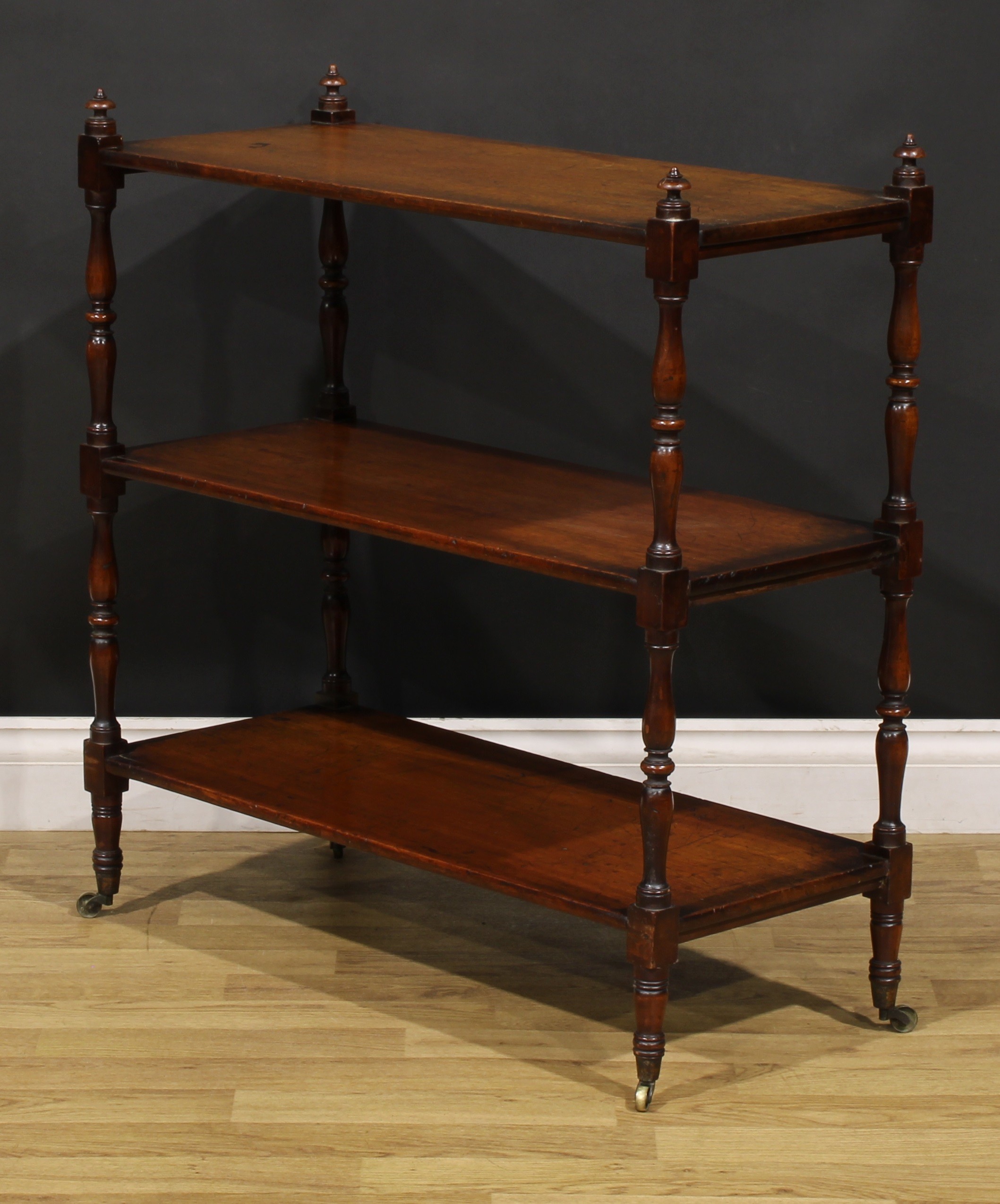 A George IV mahogany rectangular three tier whatnot, turned finials and supports, brass casters, - Image 4 of 5