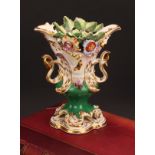 A Coalport Rococo Revival pedestal vase, painted with butterflies and flowers in shaped reserves