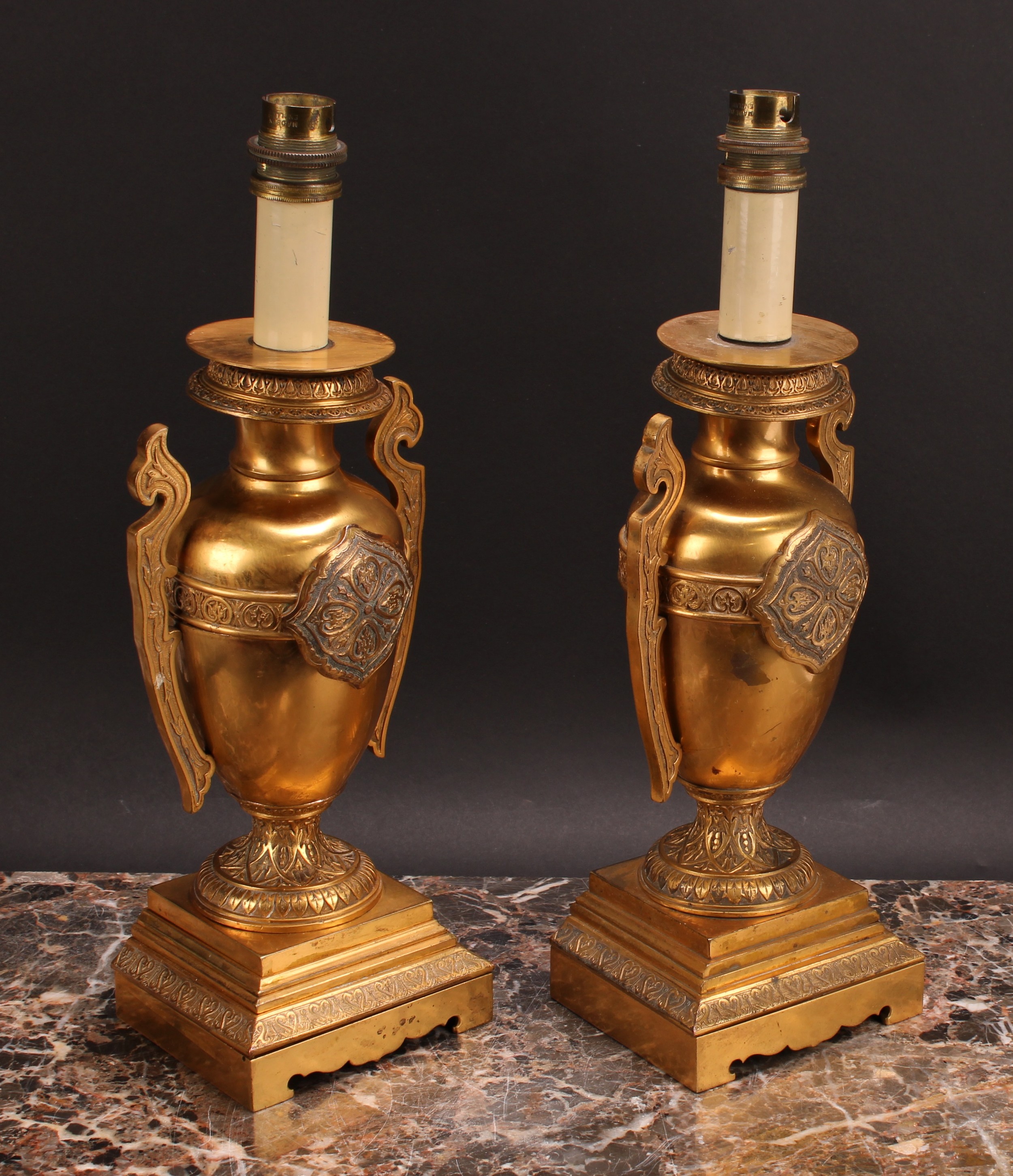 A pair of French Grecian Revival gilt bronze ovoid table lamps, cast and chased with palmettes and - Image 2 of 2