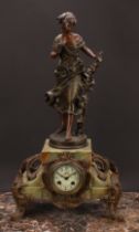 An early 20th century French spelter mounted onyx mantel clock, 7.5cm enamel dial inscribed with