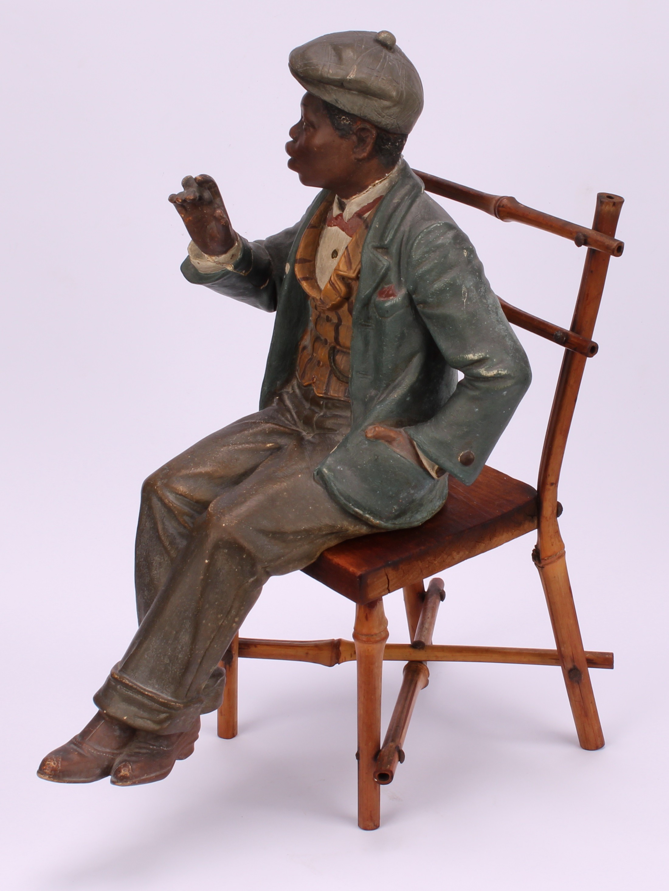 An early 20th century Austrian terracotta model, of a young African-American boy, finely dressed and - Image 3 of 5