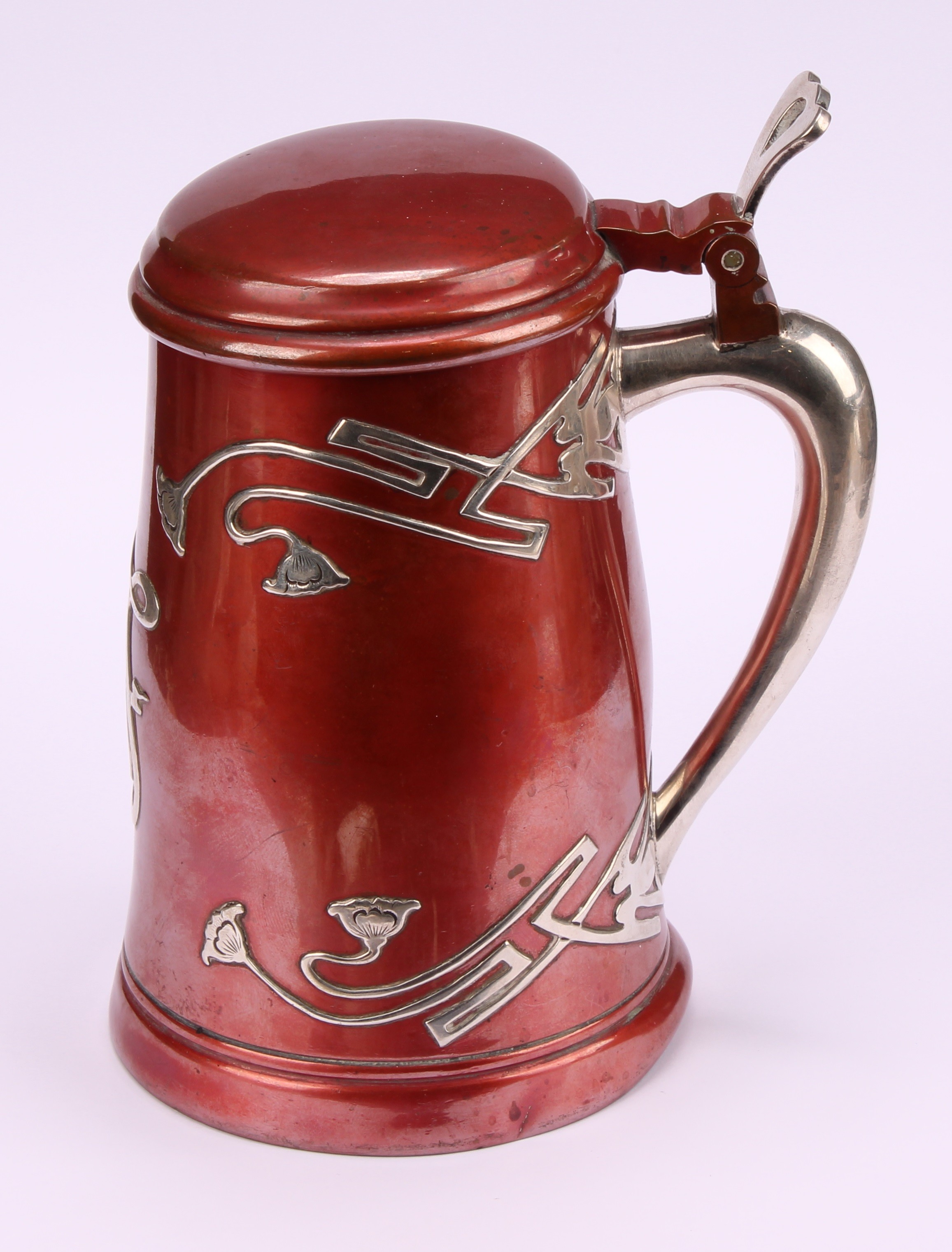 An American Art Nouveau silver overlaid mixed metal tankard, applied with stylised flowers and - Image 2 of 6