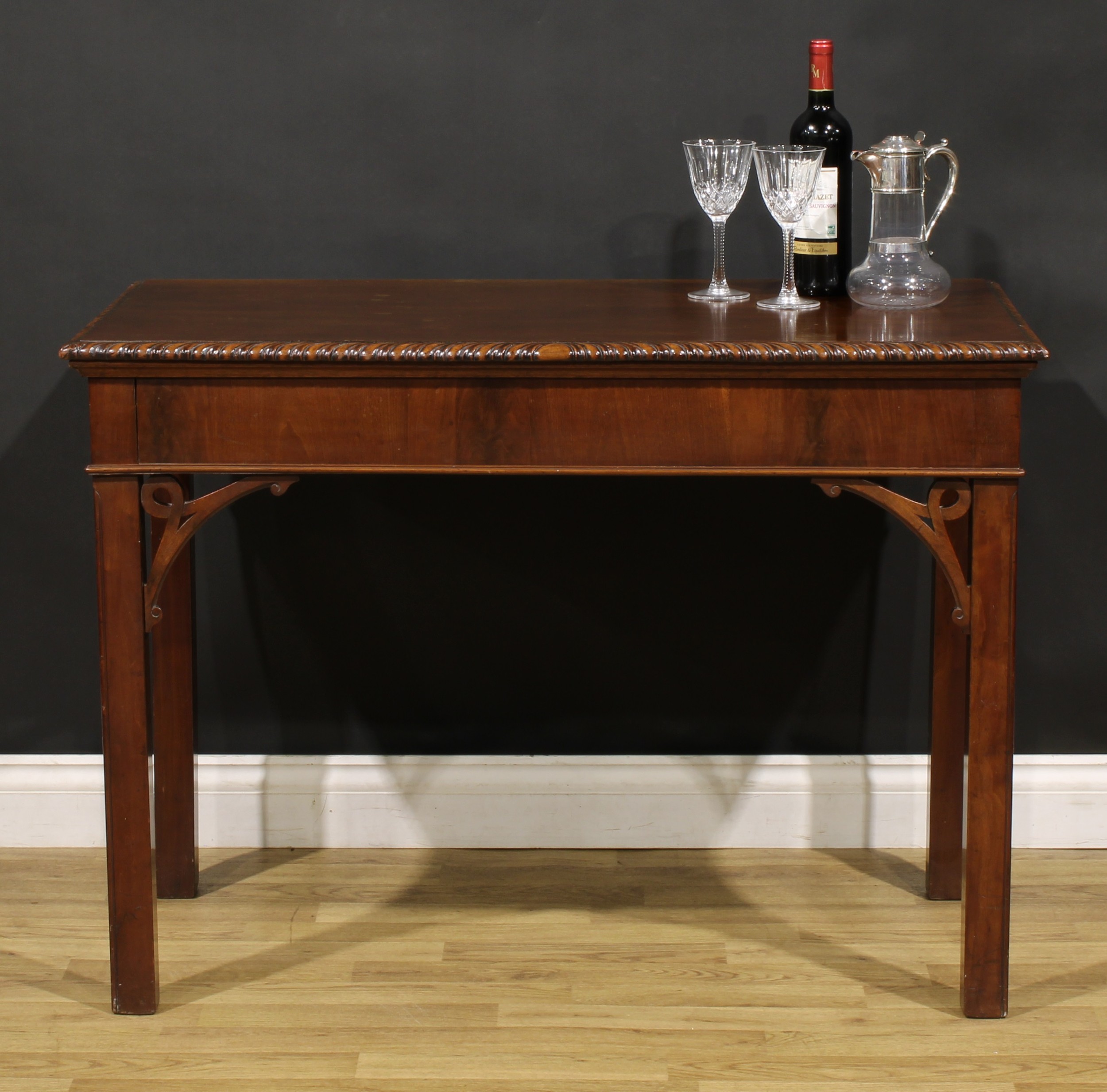 A 19th century Chippendale Revival mahogany side or serving table, rectangular top with gadrooned