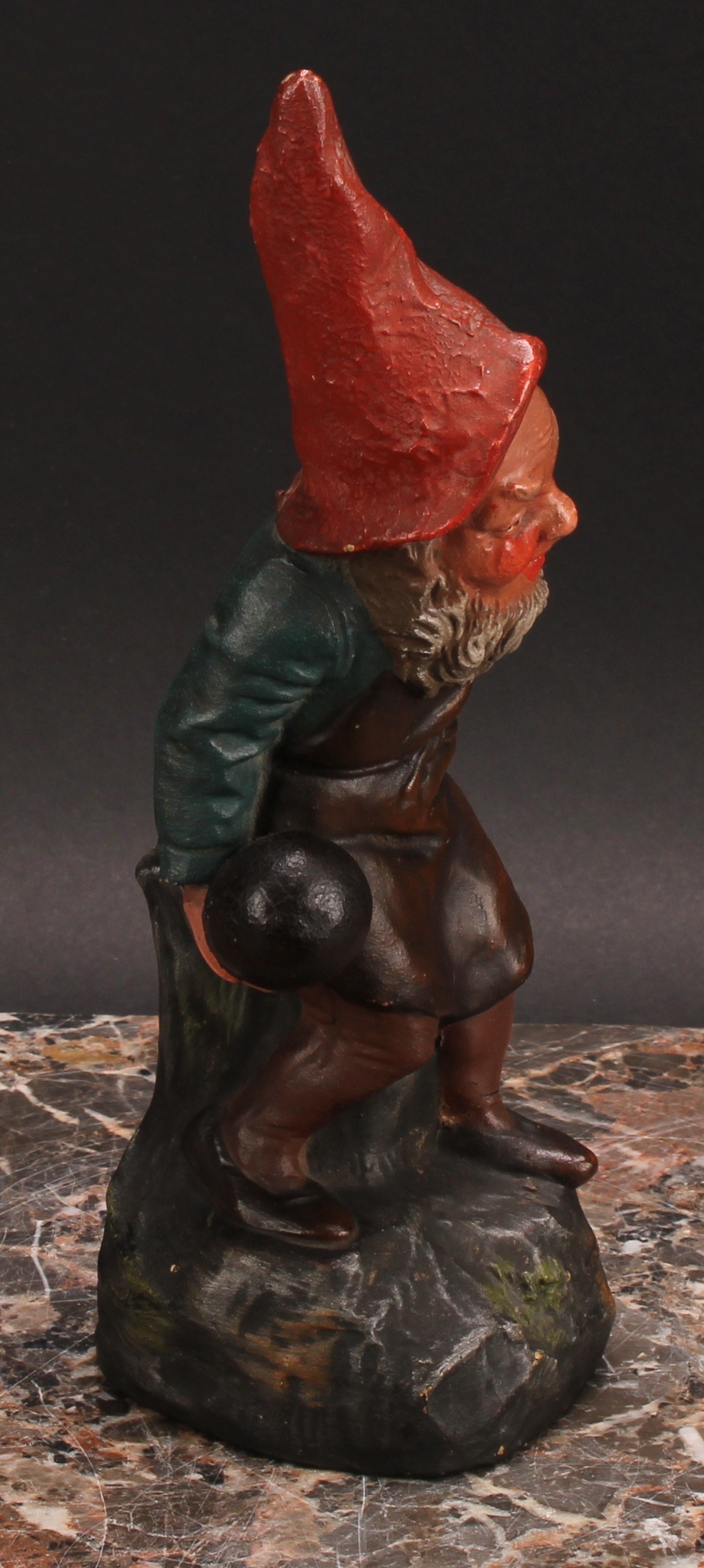 An Austrian terracotta gnome, by Johann Maresch, he stands, beside a barrel, holding a bowling wood, - Image 3 of 6