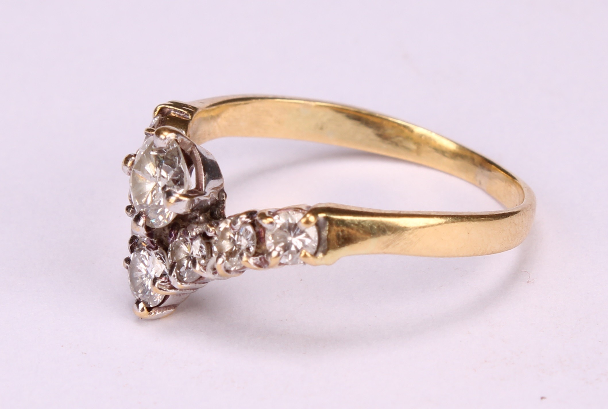 A diamond V ring, set with eight round brilliant cut diamonds, total estimated diamond weight 1. - Image 3 of 5