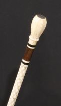 A 19th century sailor's maritime whale bone walking cane, octagonal pommel set with a coin, the