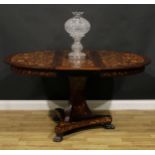 A 19th century Dutch marquetry extending dining table, discorectangular top with one additional