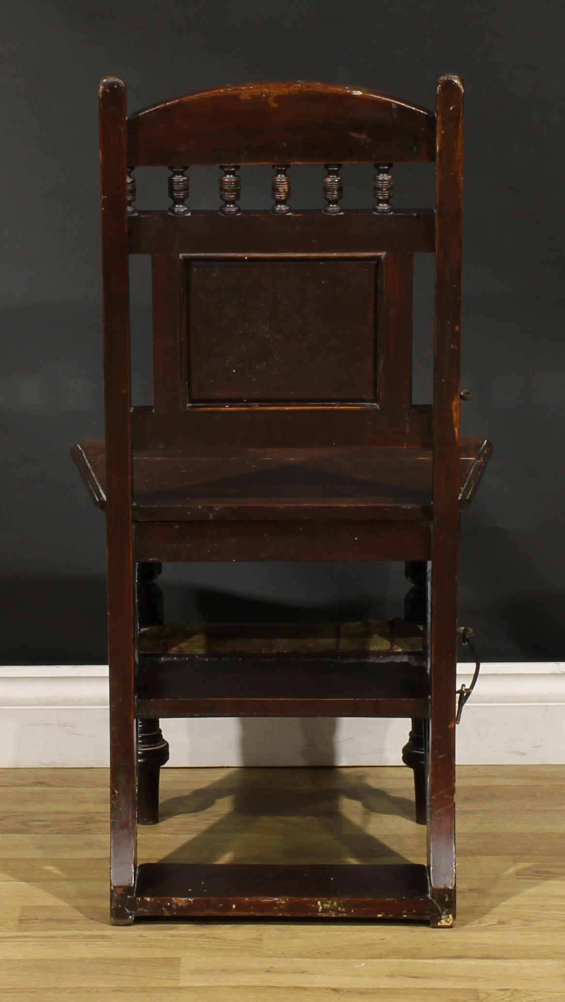 A late Victorian Aesthetic Movement metamorphic library step chair, spindle back with carved central - Image 4 of 6