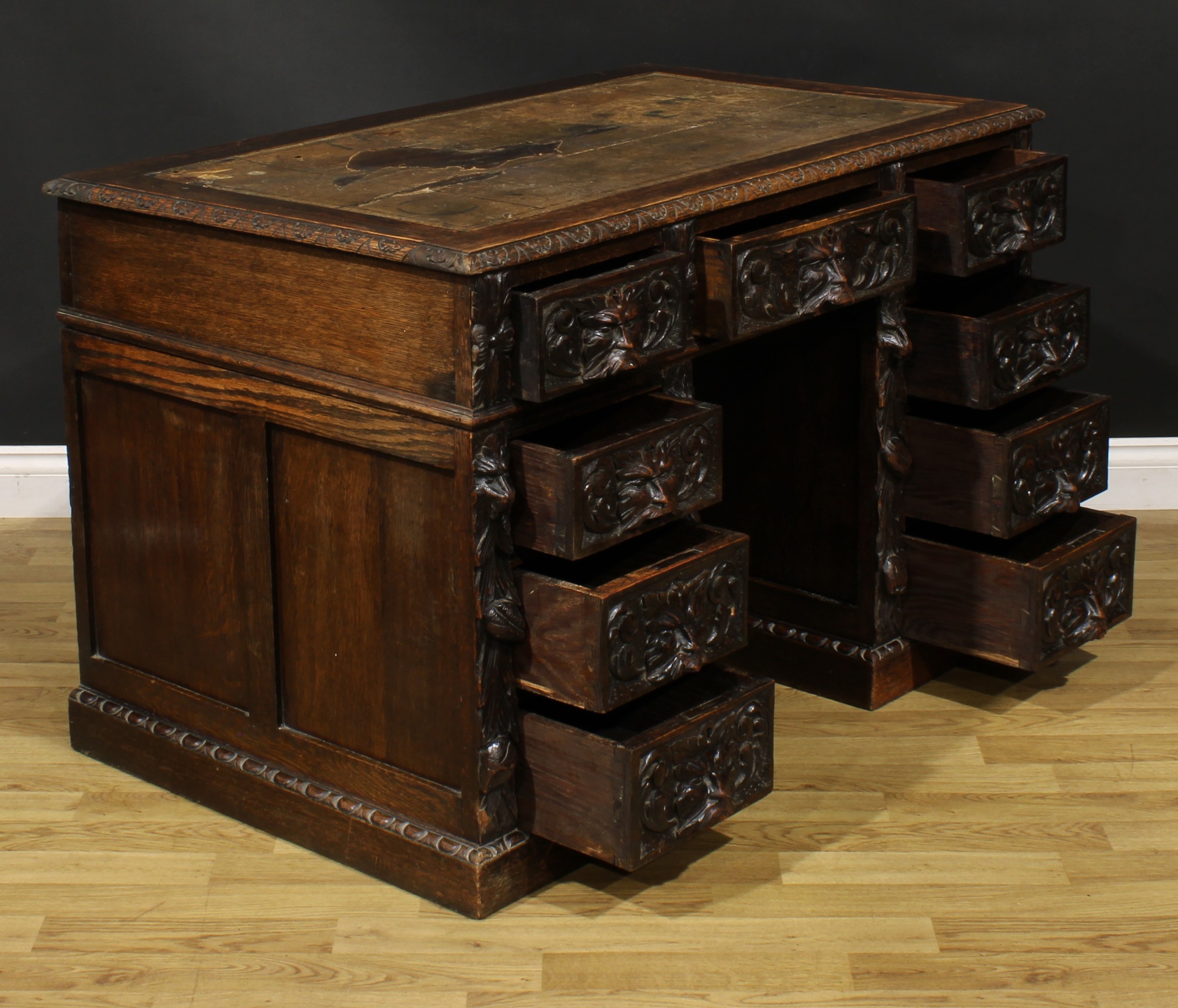 A late Victorian oak twin pedestal desk, rectangular top with foliate carved edge and inset - Image 4 of 6