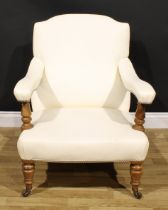 A Victorian walnut easy chair, in the manner of Howard & Sons, stuffed-over ostrich hide upholstery,