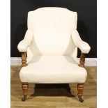 A Victorian walnut easy chair, in the manner of Howard & Sons, stuffed-over ostrich hide upholstery,