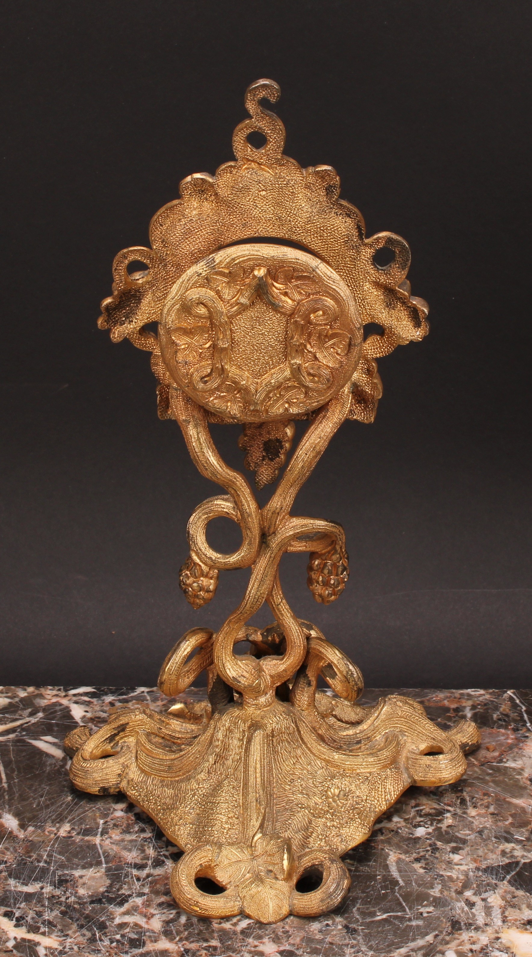 An early 20th century gilt metal pocket watch stand, cast throughout with fruiting vine, triform - Image 4 of 4