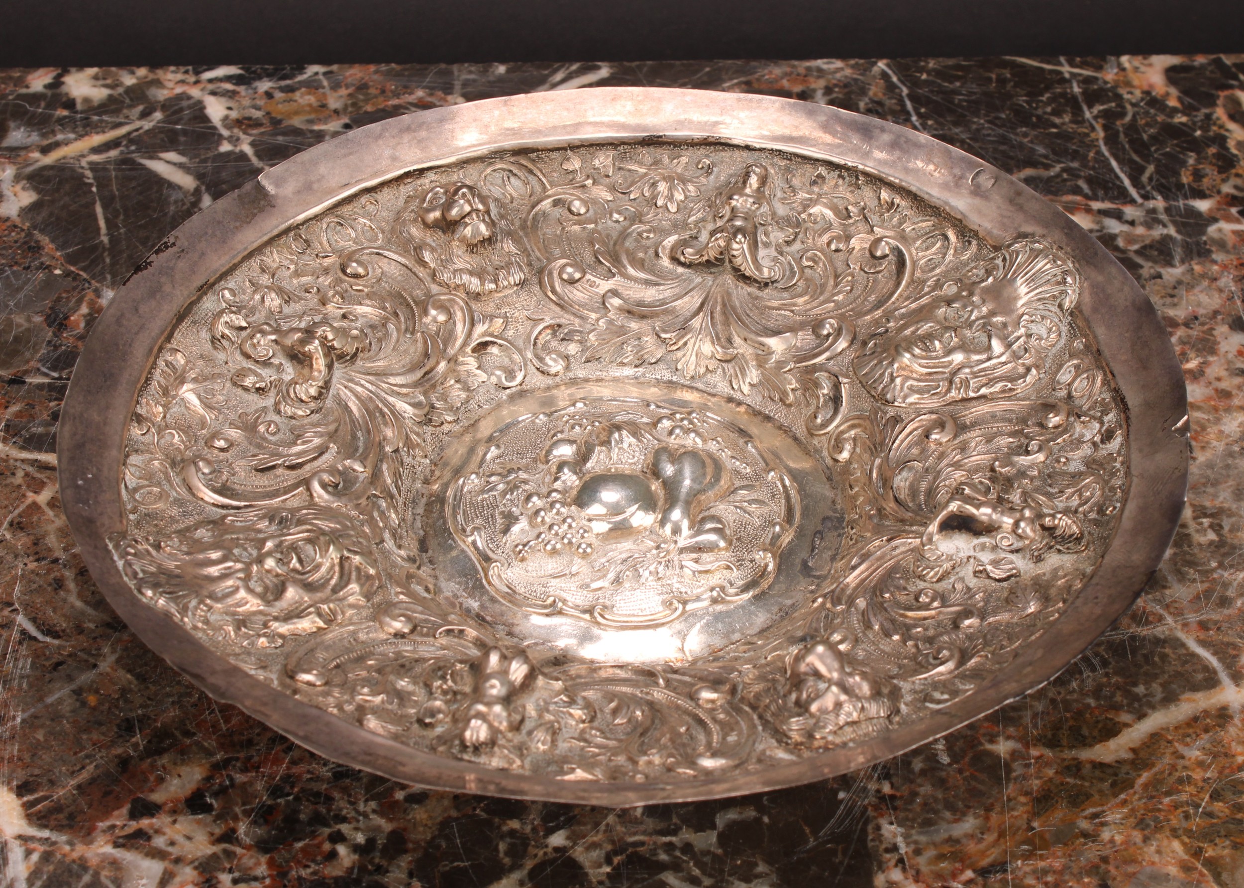 A Continental silver dish, probably German, repousse chased with mermaids, and lion and grotesque - Image 2 of 3