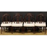 A set of eight Hepplewhite Revival mahogany dining chairs, comprising six side chairs and a pair
