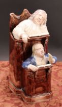 A Staffordshire pearlware figure group, The Vicar and Moses, with a sleeping vicar in the higher