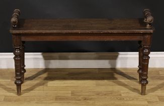 A Victorian oak window seat, canted rectangular top with turned handles, turned legs, 55cm high,