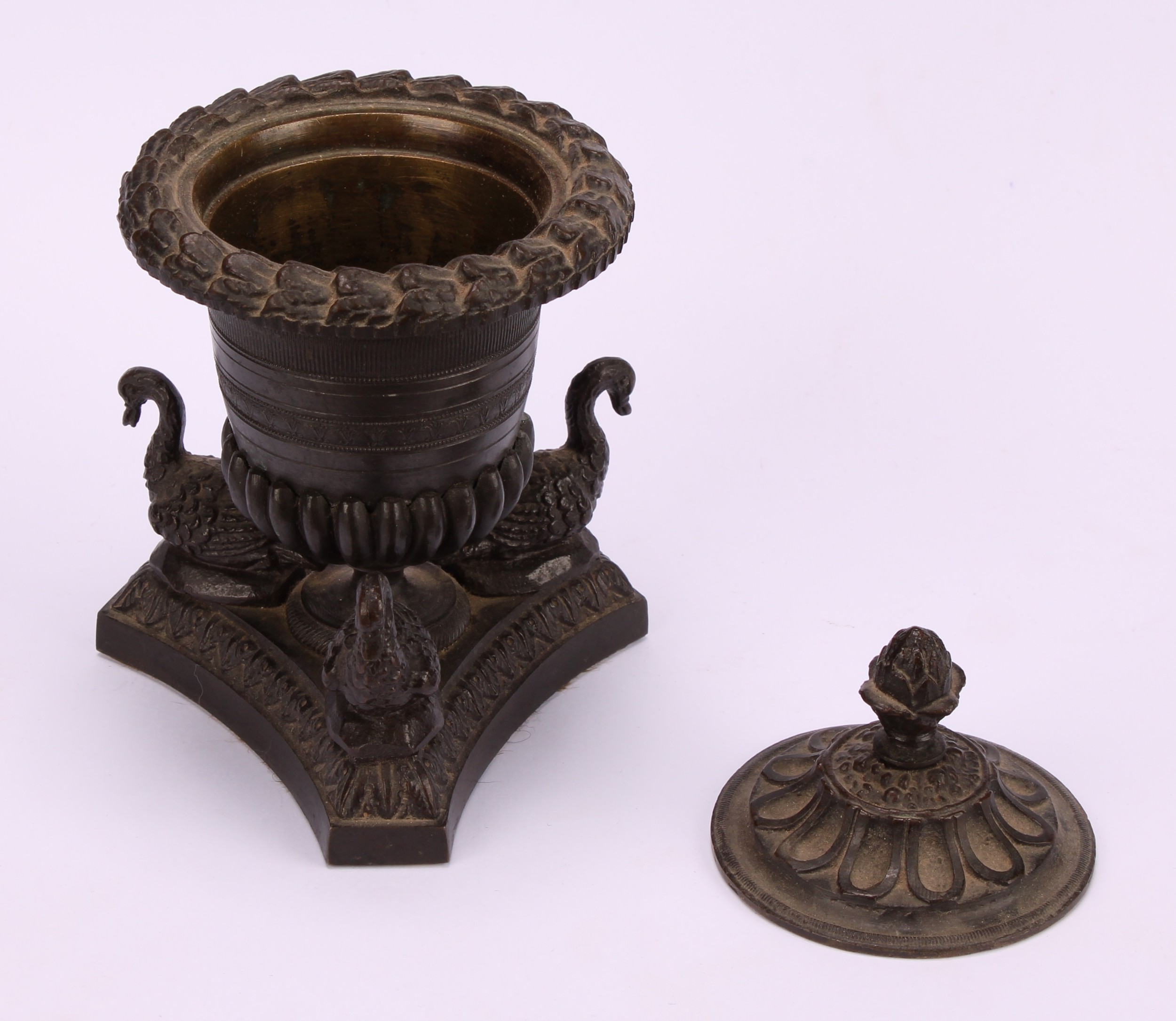 A Regency dark patinated bronze half-fluted campana inkwell, the incurve canted triform base applied - Image 4 of 4