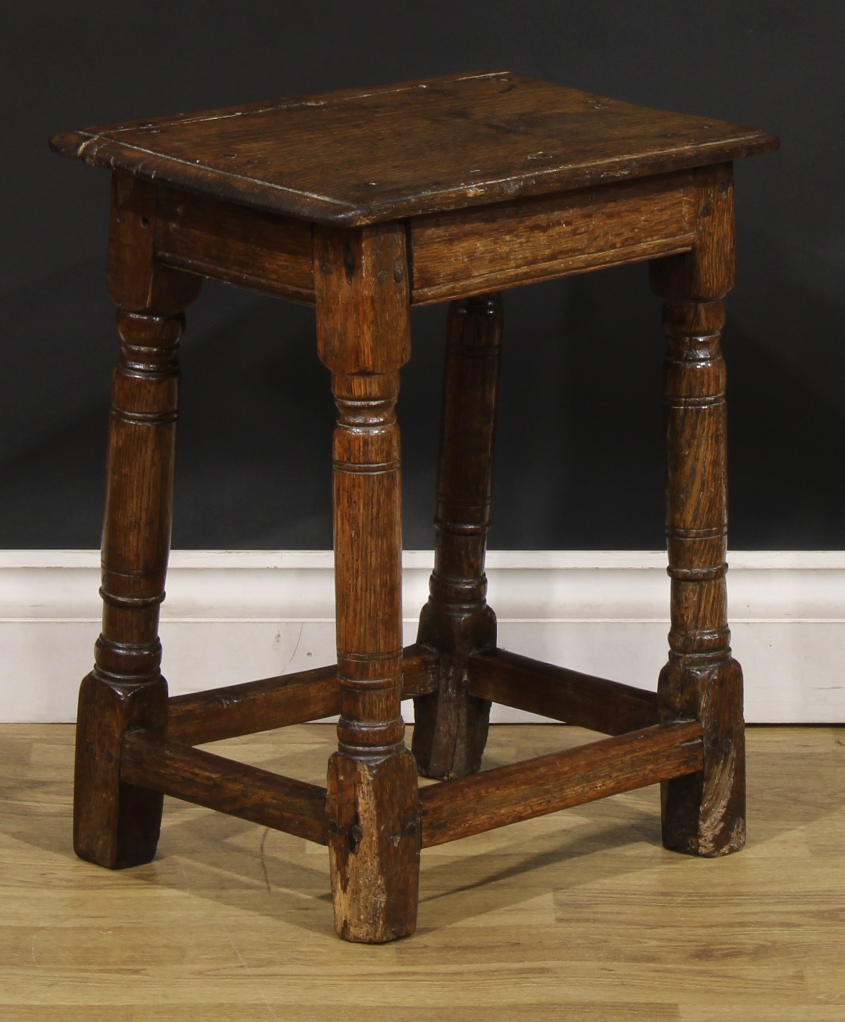An 18th century oak joint stool, oversailing top above a deep frieze, turned legs, plain stretchers, - Image 2 of 4