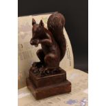 Manner of Henry Leach (1809-1885), a contemporary composite simulated oak model, of a squirrel, in