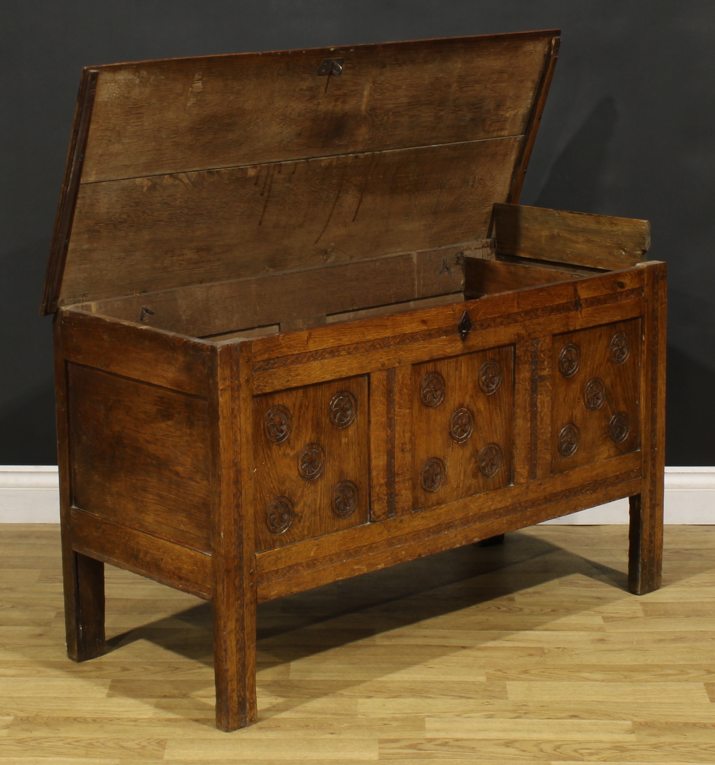 An 18th century oak blanket chest, hinged top enclosing a till above a three panel front, carved - Image 3 of 5