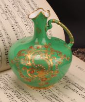 A Royal Crown Derby compressed ovoid ewer, decorated with gilt Rococo style leafy scrolls and