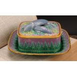 A George Jones majolica rounded rectangular sardine box and stand, the cover surmounted by fish,