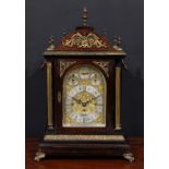 A substantial Victorian gilt metal mounted rosewood musical bracket clock, in the George II taste,