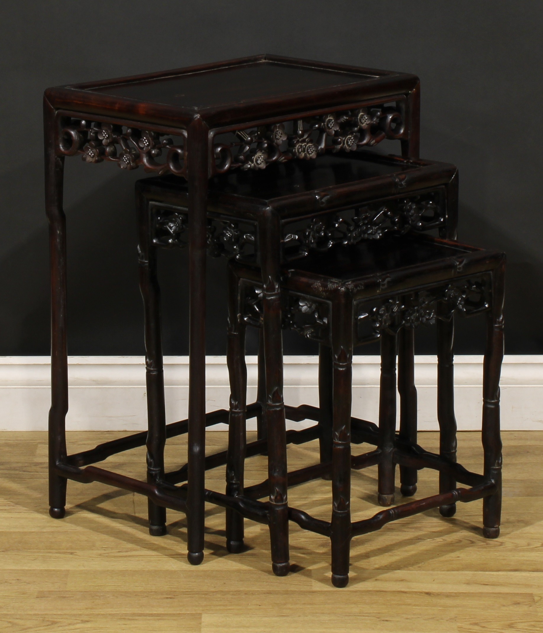 A Chinese hardwood harlequin nest of three occasional tables, each with a rectangular panel top, - Image 2 of 5