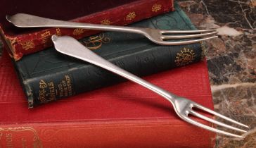 A pair of Queen Anne Britannia silver Dog Nose pattern three-prong forks, John Broake, London 1703