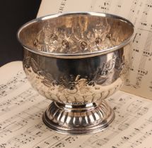 A Victorian style silver half-fluted pedestal bowl, chased with swags of flowers, 16cm diam,