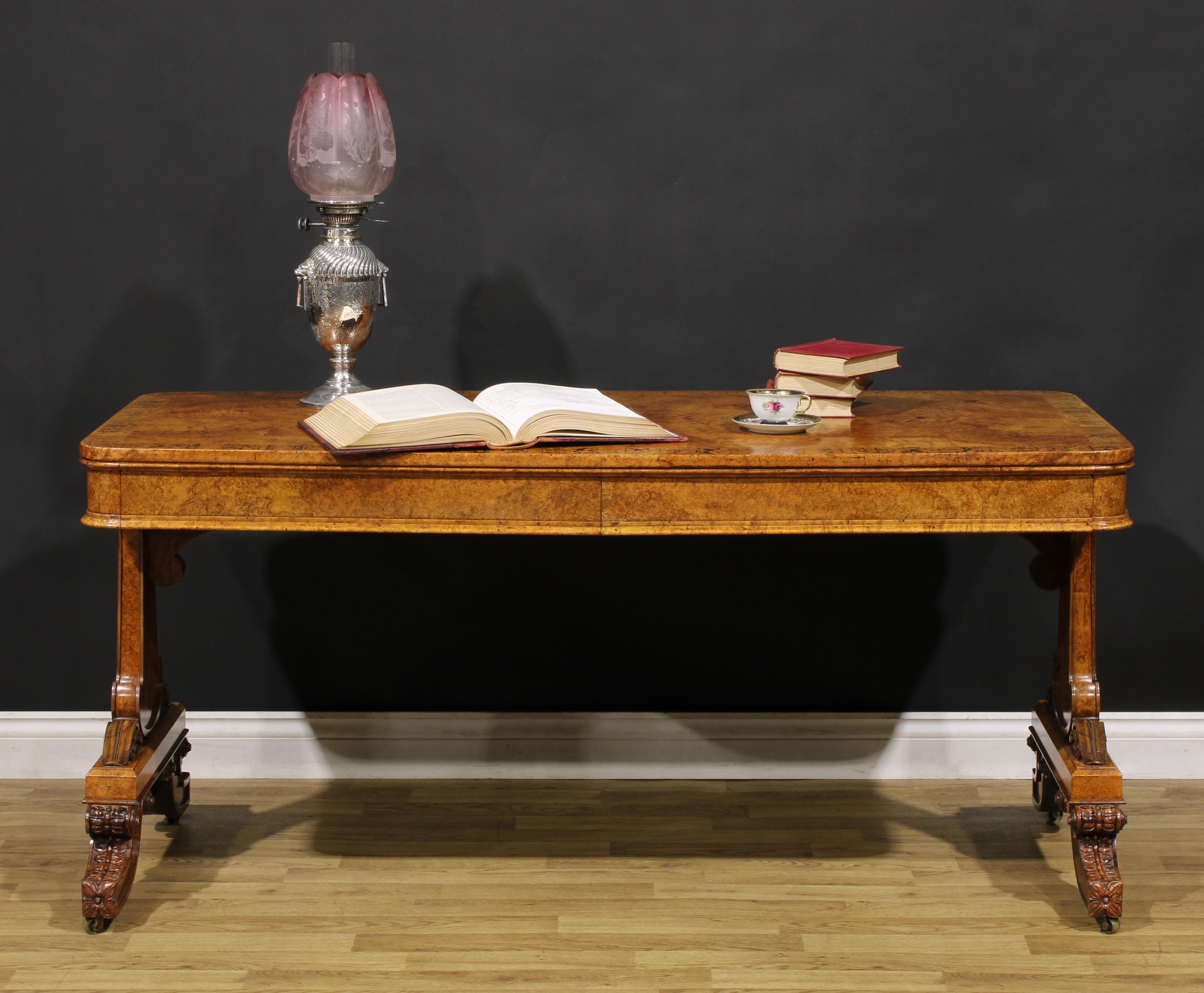 A William IV burr walnut and zebrawood marquetry library table, in the manner of George Bullock,