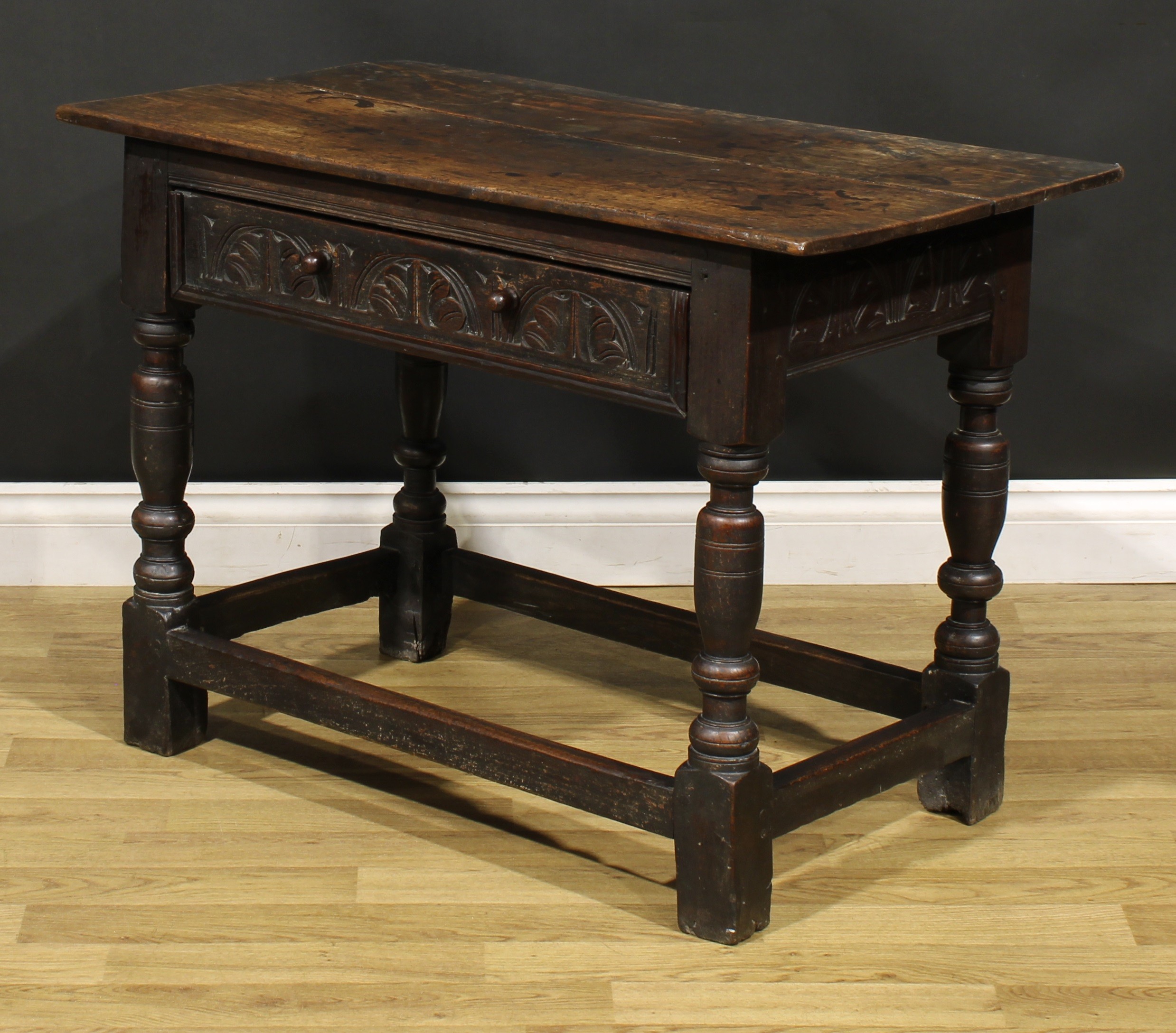 A 17th century oak side table, oversailing top above a long frieze drawer carved with leafy - Image 5 of 6