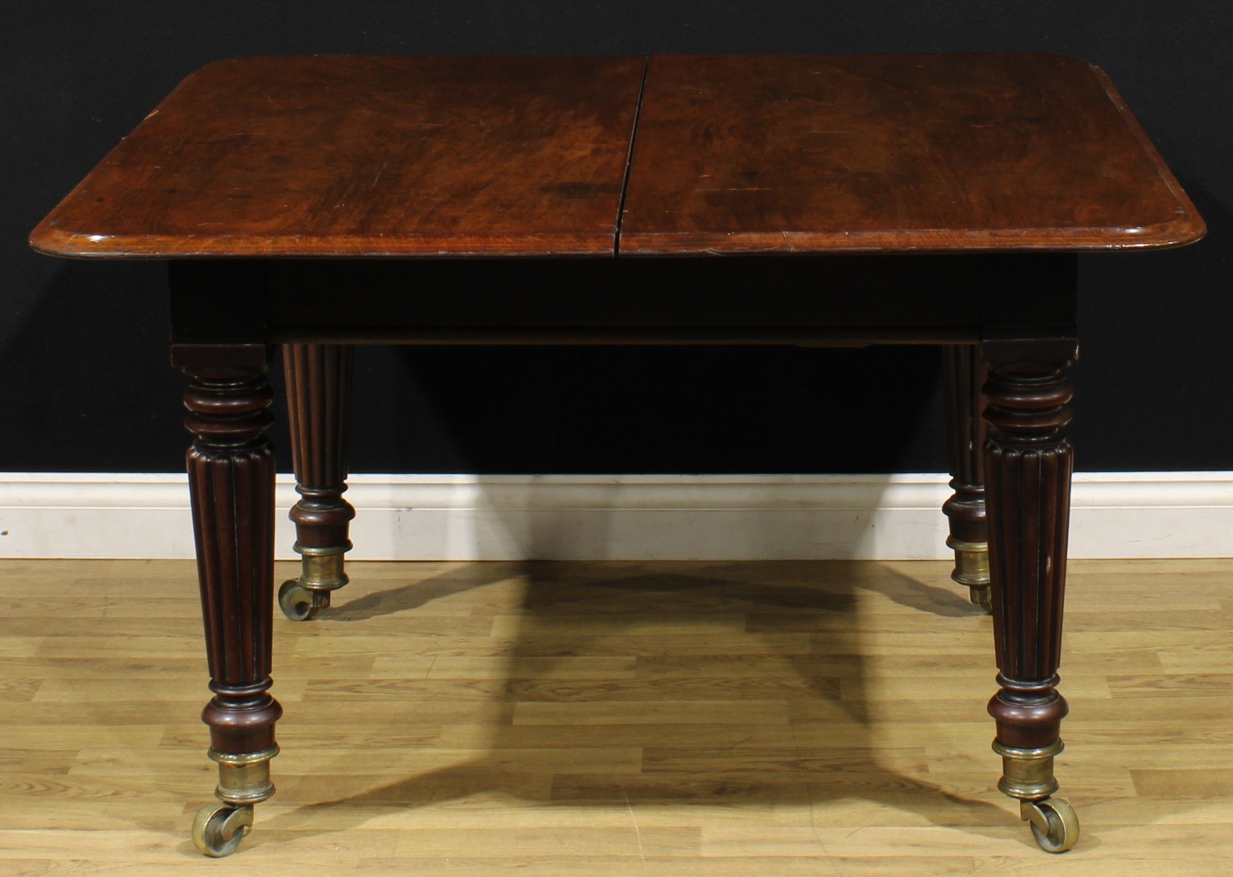 A 19th century mahogany extending dining table, in the manner of Gillows of Lancaster and London, - Image 3 of 3
